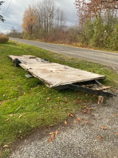 This is a used flatbed trailer that is sold AS IS. The trailer is a solid base for a project. This f...