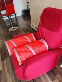 Red recliner sofa with cover