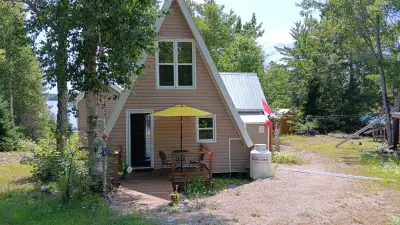 This is in TEMISCAMING QUEBEC A frame Waterfront cottage for sale. 4 hours from Toronto. 3 bedroom a...