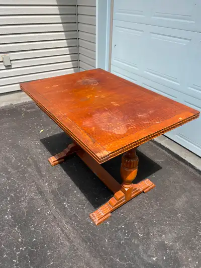 80 YEAR OLD WALNUT DINING TABLE WITH 4 CHAIRS 8 PEOPLE CAN SIT AROUND IT SOME STAINING ON TABLE TOP...