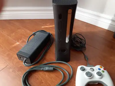 XBox 360 with controller in excellent condition.