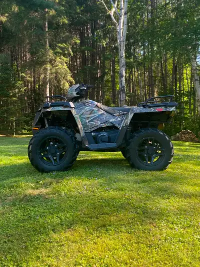 Hi, Polaris 570 sportsman 2018. Heated grips upgraded rims and runs great. Looking for 5750 or trade...