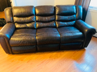 Dark brown reclining leather sofa for sale.