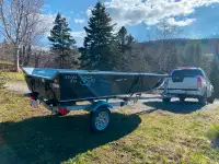 14 ft aluminum boat, motor and trailer $5000 obo