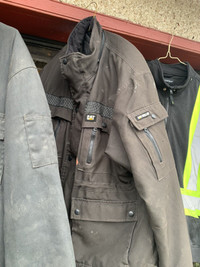 Assorted and insulated coveralls and three no Max Coats
