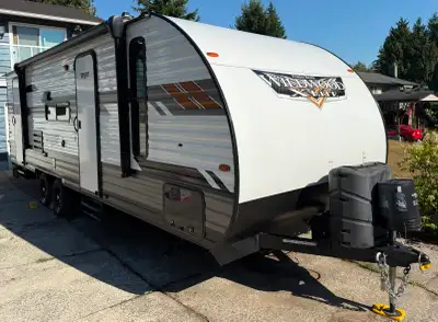For private sale, single-owner 2021 Forest River Wildwood X-Lite 240BHXL Travel Trailer. Less than 1...