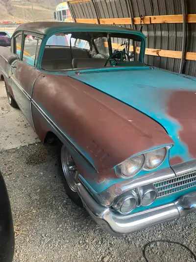 58 Chev runs a nd drives bc title needs interior done and glass installed 327 2-speed auto new tires...