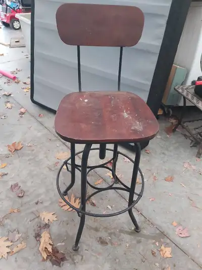 Swivel chair. Hardwood seat and back. Seat is 31" high., View more