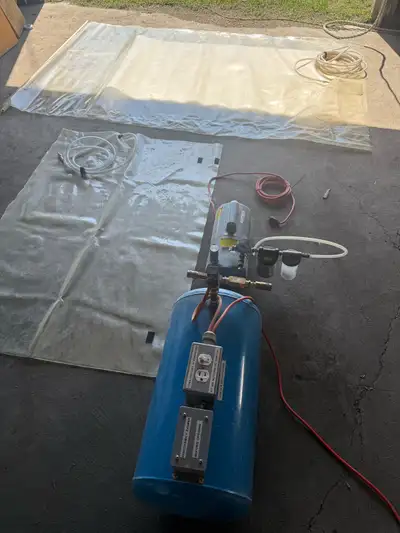Veneering vacuum pump setup, includes 2 large bags, GE vacuum pump and extra tank for reservoir. Sel...