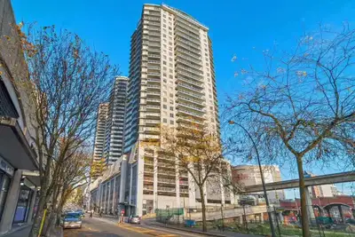 This modern apartment is right above the New Westminster Skytrain Station and across from Douglas Co...