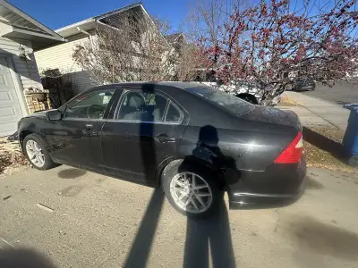 Selling a 2010 ford fusion, 3L v6 FWD. Bluetooth, automatic. Don’t drive it anymore and need it gone...