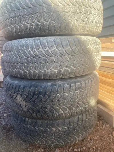 4 studded winter tires on rims Bolt pattern 5x114.3 Size 215/65r16 No bends rims need paint $450 obo...
