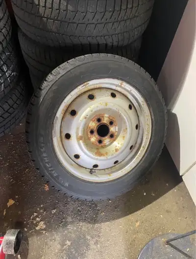 Set of winter tires off a Subaru Impreza and ready to switch onto yours in the fall. The tires fit m...