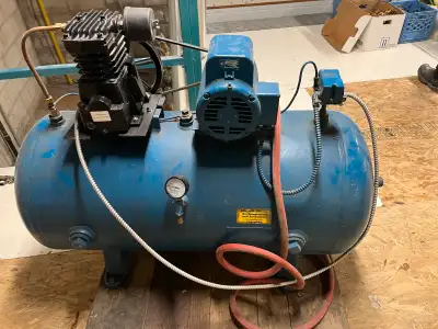 Quick sale this weekend Air compressor 50 inches long tank by 23 inches high About 23 inches diamete...