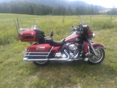 2012 HD Ultra Classic Electra Glide with Touring Pack, Ember Red Sun Glow/Merlot Sun Glow, $15,900 5...
