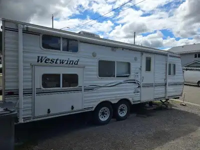 Hello we are selling our 02 westwind camper trailer. Sleeps up to 8. Single bunks. Table folds to be...