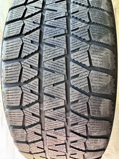 Selling a full set of 4 Bridgestone winter tires mounted on 16" steel rims. Tire size: 205/55R16 91H...