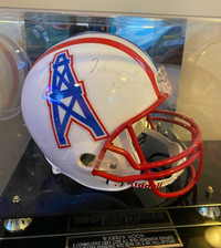 Warren Moon signed helmet in acrylic case.  
