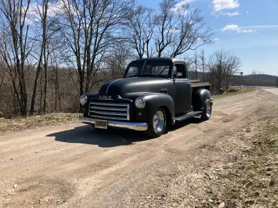 Feast your eyes on this stunning 1953 GMC pickup, a true classic that's been lovingly restored, with...