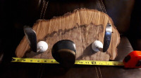 Golf Head Coat Rack on Live edge piece of wood. AWESOME!