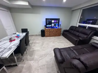A beautiful walk in- walk out fully furnished basement with a private washroom and kitchen Available...