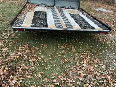 2010 double tilt snowmobile trailer (it fits 2 large sleds) It has all been redone from wiring, meta...