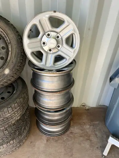 Selling a set of jeep rims, 5 total. The only information I have is what’s in the pictures. More tha...