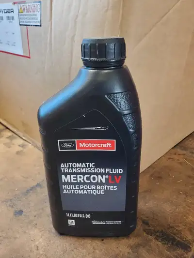 Ford Motorcraft Mercon LV transmission fluid. New unopened. Have several bottles available. Sold veh...