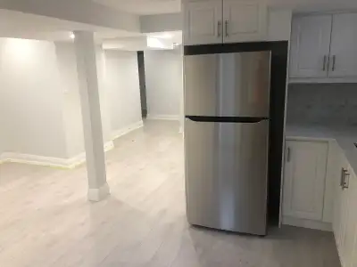 Spacious 3-bedroom for rent with a covered stairwell close to major grocery stores.