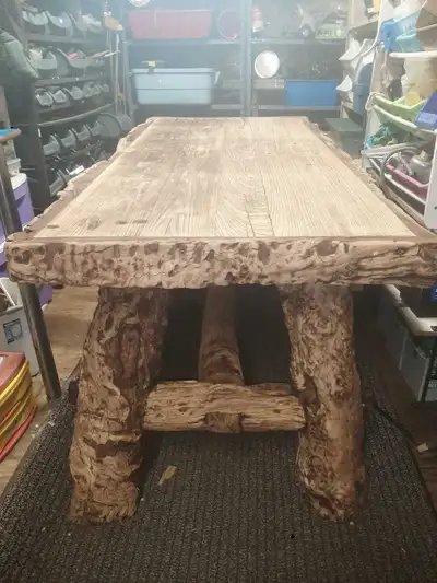 Sustainable treated and burned beetle kill burl table, View more