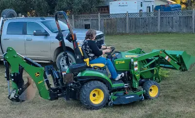 Like new tractor in great shape. No leaks Comes with lawn attachment for mowing and both buckets. 56...