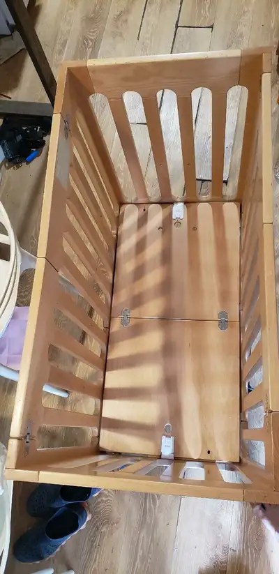 I'm selling a Bloom Alma Mini Crib, perfect for smaller spaces and easy to move around with its whee...