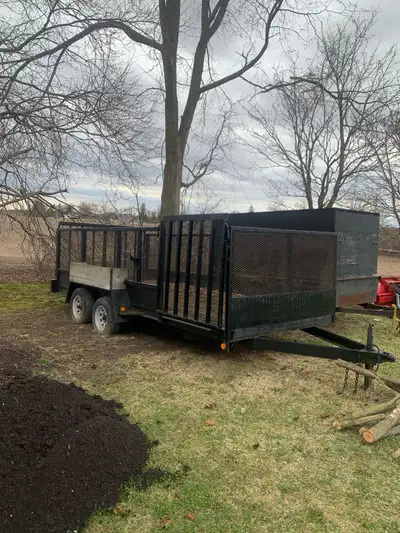Landscape trailer with higher mesh sides, side gate and double rear gate.