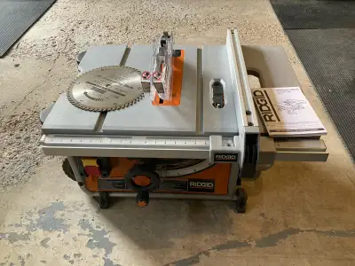This Ridgid 10-inch table saw is in good, pre-owned condition and is ready to tackle your next woodw...