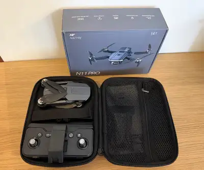 Selling a like new Nafyre N11 Pro GPS drone with camera, perfect for adults, offering 4K UHD video,...