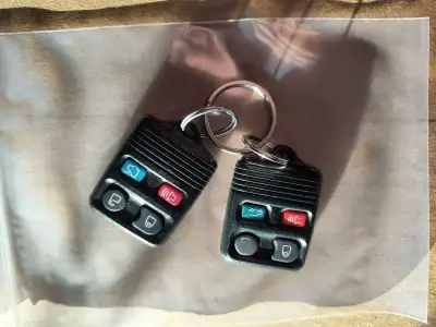 Ford Key Fobs.One new and the other gently used by senior.