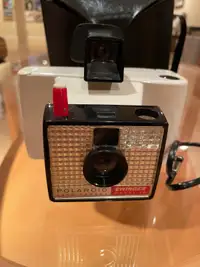 Antique Polaroid swinger camera with original case