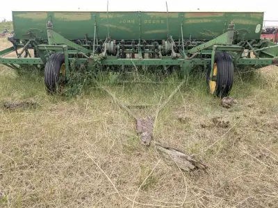 For sale is a 14 ft John Deere Disc drill