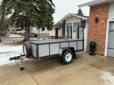 2005 Utility trailer Heavy Duty Built, 2500 lb axle with springs new rims, tires 15 inch with a spar...
