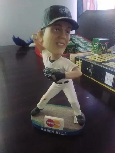 Aaron Hill bobblehead, no box. Good shape just dusty. Blue jays giveaway, nesting dolls. Delgado, Hu...