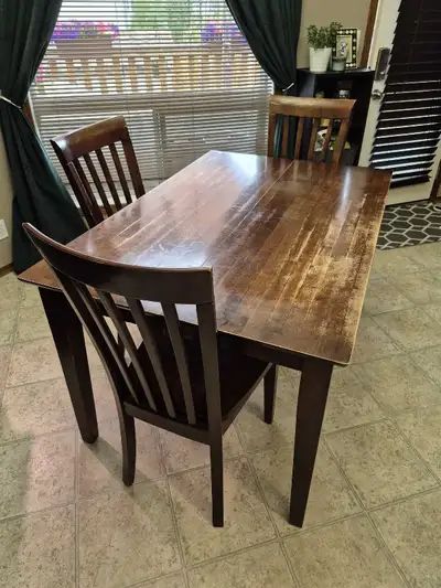 good quality table and 4 chairs, View more