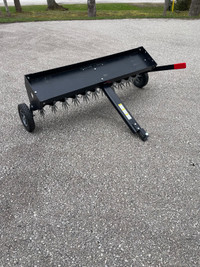 Brinly 40” tow behind Aerator 