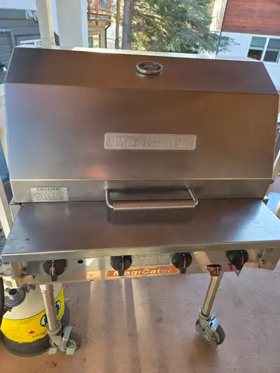 MagiCater commercial-style propane BBQ in great working condition. Heavy-duty stainless steel Multip...