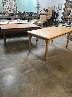 two kitchen tables $25.00 each OBO approx 3 x 5' brown one extends to 6'