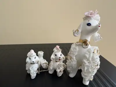 Three porcelain poodles, super cute! I’m perfect condition. Mom 5” and pups are 2” tall. Popular in...