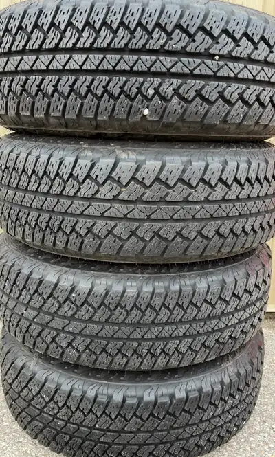 EXCELLENT COND 4 x 255/70/18 BRIDGE STONE DUELLERS ALL SEASON TIRES $750 (NO RIMS) 90% TREAD LEFT ON...
