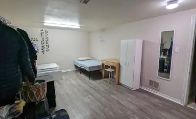 Sharing room For 1 GIRL - Spacious furnished room in basement with 2 windows for FEMALE students or...