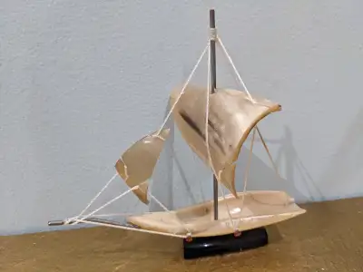 Hand carved horn sailboat, View more