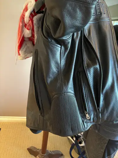 REDUCED! Genuine quality leather riding jacket. Double venting on each side, mesh backing, zippered...