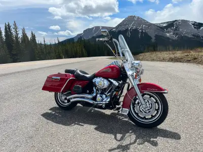 The 2007 Harley-Davidson Road King Firefighter Edition (FLHR) features a fire-engine red paint schem...